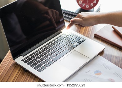 The Tip Of The Finger Is Pressing Down The Keypad. Turn Off The Computer.