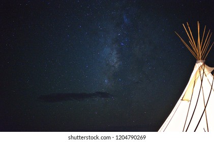 tipi camping under stars and mikyway - Powered by Shutterstock