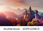 Tipical postcard. Majestic Neuschwanstein castle during sunset, with colorful clouds under sunlight. Dramatik Picturesque scene. fairytale Castle near Munich in Bavaria, Germany. Natural Landscape.