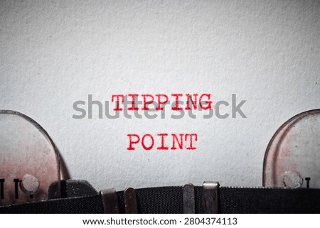 tipping point message concept written with a typewriter