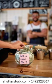 Tips Jar - Satisfied Customer In Coffee Shop.
