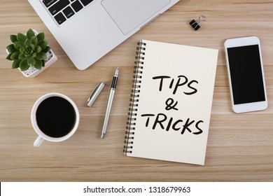 Tips And Tricks Concept On Desktop Workspace With Office Supplies.