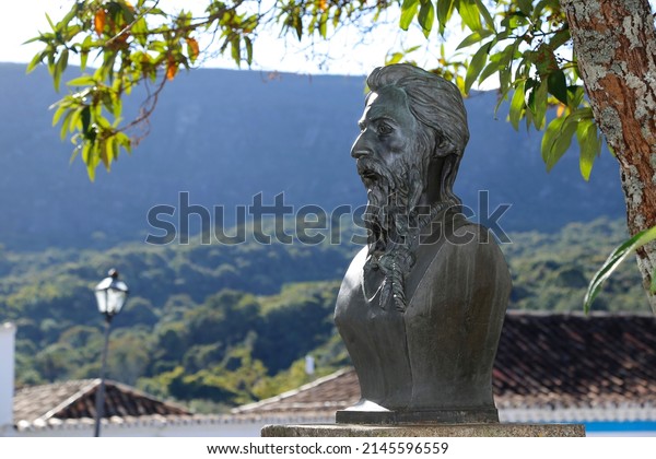 Tiradentes,\
Minas Gerais, Brazil - July 14, 2021: Tiradentes metal statue\
representing the ensign on a public\
road