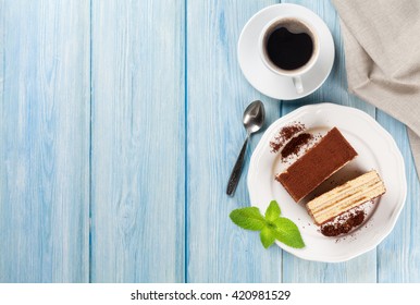 Tiramisu Dessert And Coffee On Wooden Table. Top View With Copy Space