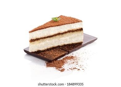 Tiramisu dessert on chocolate bar isolated on white background. Italian sweet dessert concept. - Shutterstock ID 184899335