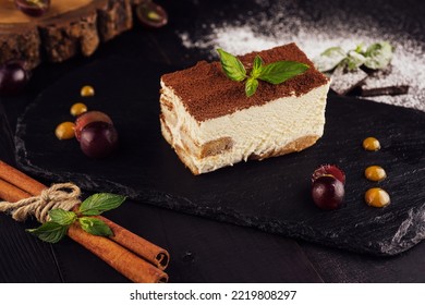 Tiramisu With Grated Chocolate And Mint Twig