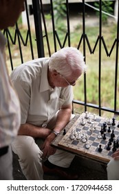 Tirana, Albania-08.08.2018: Old Men Are Playing Chess In Park