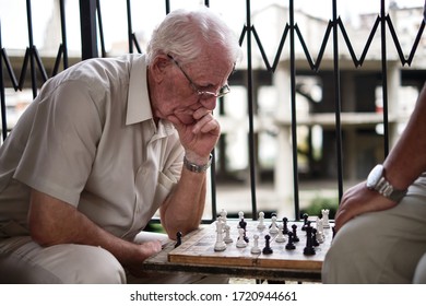 Tirana, Albania-08.08.2018: Old Men Are Playing Chess In Park