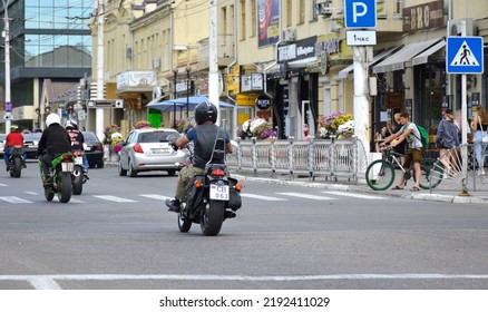 Tiraspol, Moldova - June 4, 2022: The Passage Of A Group Of Bikers Along The Central Street Of The City. Lifestyle For Men And Women, Freedom Of Movement And A Positive Attitude Towards Life