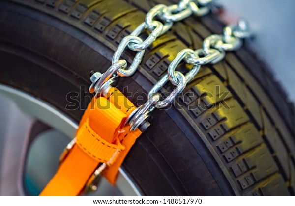 Tire chain. Chains and anti-skid belts on\
the wheels of the car. Adaptations for increase of coupling\
properties of wheels on ice. Off-road\
wheel.