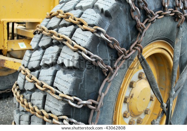 Tire Chains on Road Grader in Denali National\
Park, Alaska