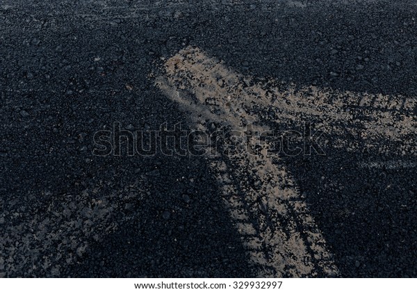 tire on asphalt\
road