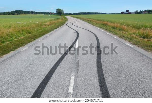 Tire print on the asphalt road\

