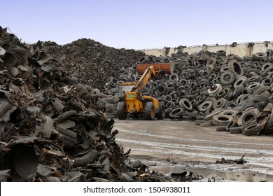 Tire Recycling Plant / Pile Of Tires Prepared For Recycling At The Factory