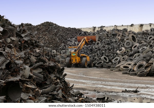 Tire Recycling Plant / Pile of tires prepared for\
recycling at the factory