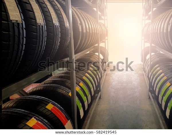 Tire rubber products , Group of new tires for sale
at a tire store.