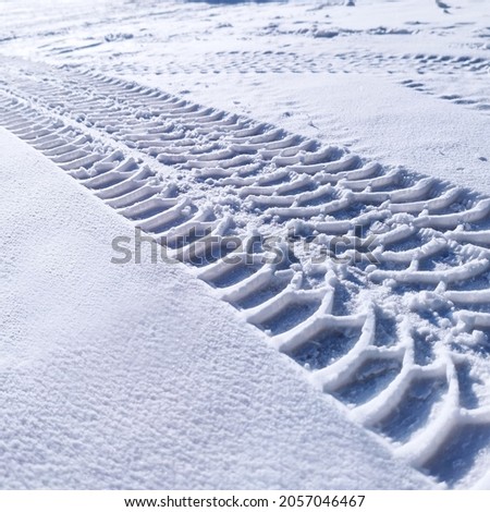Tire track in the snow.