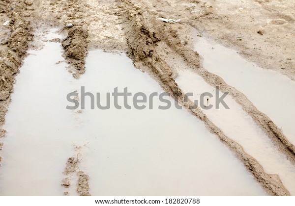 Tire tracks in the\
mud