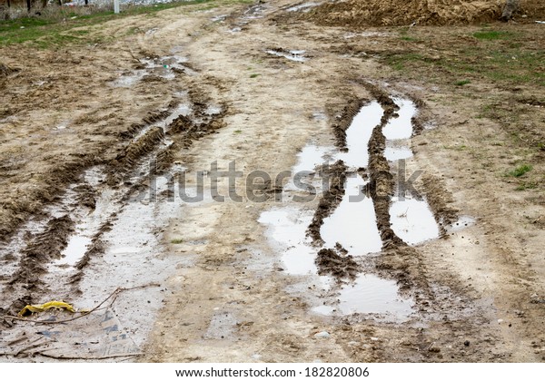 Tire tracks in the\
mud
