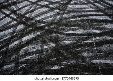 tire tracks on snow road, texture winter road, ice, motor transport danger background