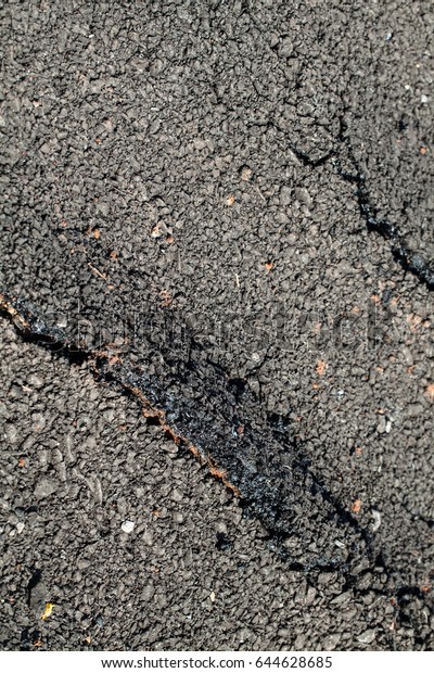 Tire tracks pattern\
prints on wet ground 