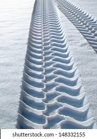 Tire Tracks In Snow