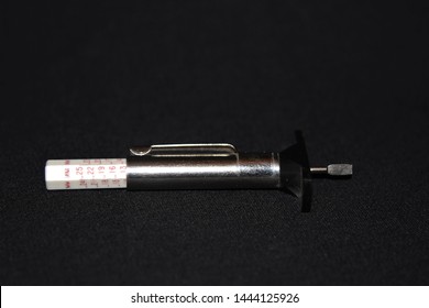 Tire Tread Depth Gauge Used To Measure Tires