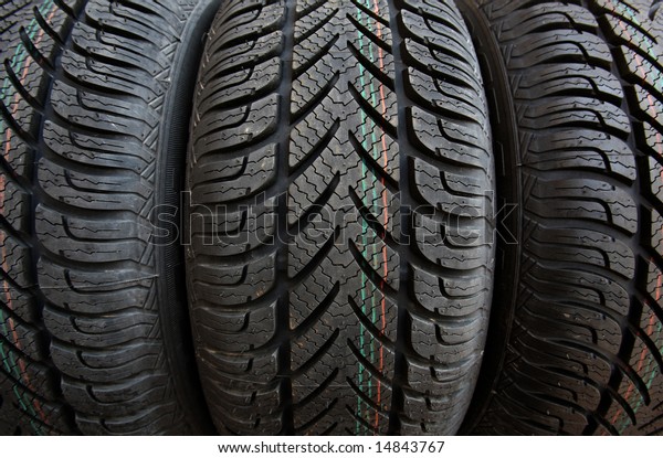 Сar tire tread pattern a chevron\
or arrow-shaped.\
A typical directional car tyre tread\
pattern.\
Directional tread patterns: sporty and safe on\
snow.