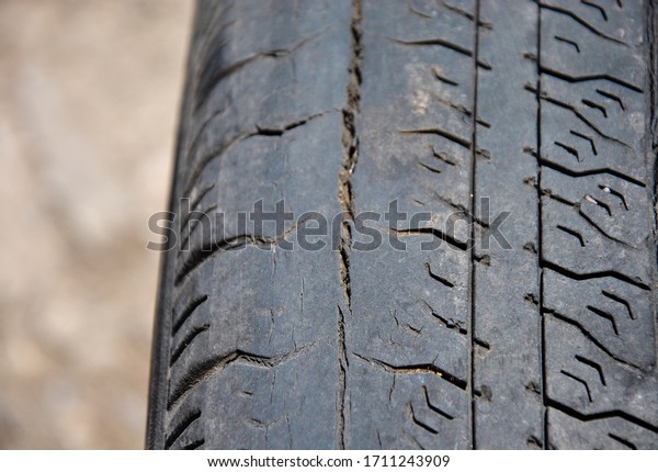 \
tire\
wear. damaged tire. old tire blurred\
background