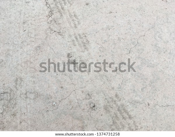 Tire wheel on\
soil floor background and\
texture