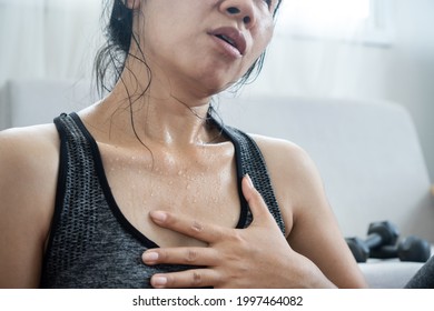 Tired Asian Woman Having Heart Attack After Doing Sport Hand Holding Her Chest Pain That Sweat From Overtraining  