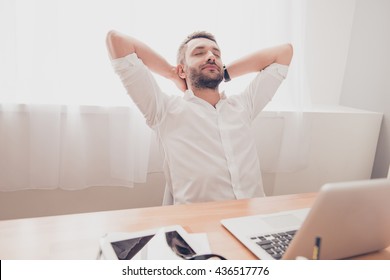 Tired Bearded Worker Having Break And Resting After Work