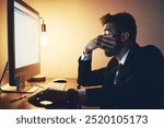 Tired, businessman and night with computer in stress for financial loss, burnout or overworked at office. Exhausted, man or employee working late with mistake for debt, pressure or bad investment