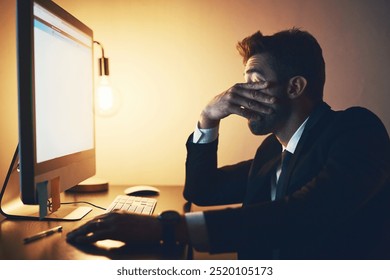 Tired, businessman and night with computer in stress for financial loss, burnout or overworked at office. Exhausted, man or employee working late with mistake for debt, pressure or bad investment - Powered by Shutterstock