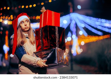 
Tired Christmas Woman Holding a big Pile of Gift Boxes. Exhausted shopper feeling the pressure and stress of the holidays 
