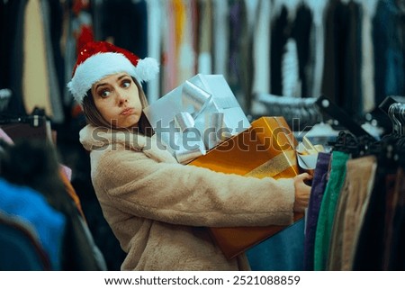 
Tired Christmas Woman Shopping Extensively in the Last Minute
Stressed girl carrying heavy presents regretting impulse buy
