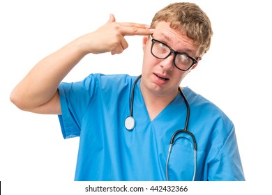 tired Crazy doctor shoot himself in the head a finger on a white background