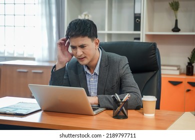 Tired Depressed Bored And Panicked Businessman Stressed Working In Contemporary Office Looking At Laptop Feel Problem At Work Casual Attire Workplace