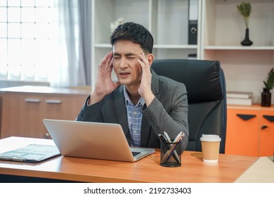 Tired Depressed Bored And Panicked Businessman Stressed Working In Contemporary Office Looking At Laptop Feel Problem At Work Casual Attire Workplace