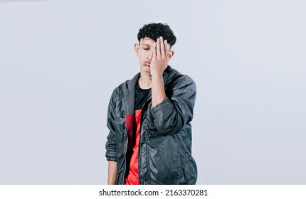 Tired and distressed people covering his face with his palm, Concept of a bored and tired man - Shutterstock ID 2163370281
