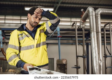 tired engineer worker hard work fatigue male staff in factory hot weather  - Shutterstock ID 2235657975