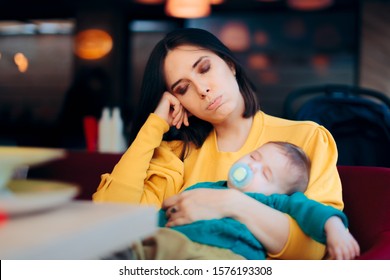 Tired Exhausted Mother Holding Sleeping Baby. Overwhelmed new mom feeling sleep deprived  and fatigued
