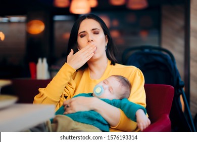 Tired Exhausted Mother Holding Sleeping Baby. Overwhelmed New Mom Feeling Sleep Deprived  And Fatigued
