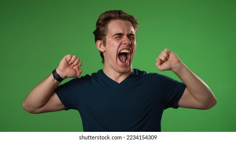 Tired fatigued headache exhausted young man 20s posing isolated on green screen background studio. People lifestyle concept. Put hands on head . - Powered by Shutterstock