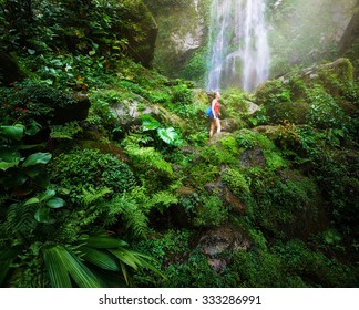 A Tired But Happy Tourist Woman Looking At The Waterfall In The Central America Jungles
Ecotourism Concept Image Travel