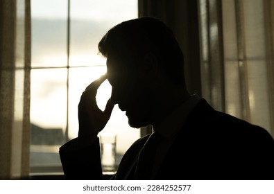 Tired, headache and eye strain from laptop. Businessman with stress, burnout and fatigue eyestrain. Business man rubbing tired eyes after computer work. - Shutterstock ID 2284252577