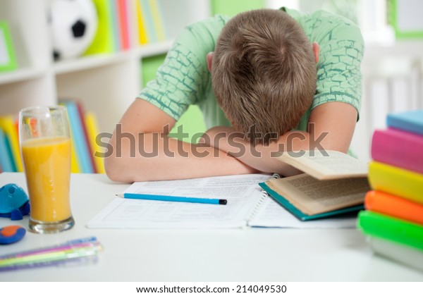 Tired Kid Sleeping On Desk Home Stock Photo Edit Now 214049530