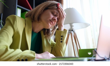 Tired Lonely Businesswoman At Workplace In Office. Financial Mistake And Overtime Concept