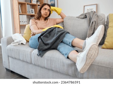 Tired maid woman, sofa and home for thinking, cloth or gloves or chaos with stress for spring cleaning. Burnout, fatigue and cleaner with fabric in housekeeping service, rest or anger on lounge couch - Shutterstock ID 2364786591