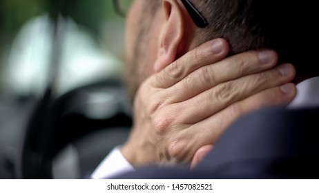 Tired Man In Suit Feeling Neck Discomfort, Driving Car, Sedentary Lifestyle